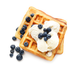 Tasty waffles with berries and ice-cream on white background