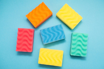 kitchen sponges on blue background