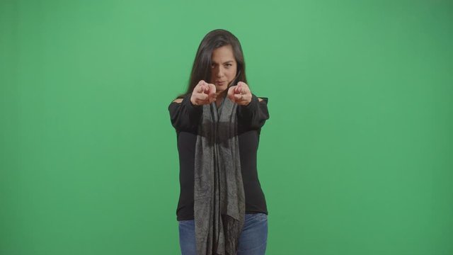 Woman Gun Pull Up Western Movie Style Gun Slinger. Studio Isolated Shot Against Green Screen Background