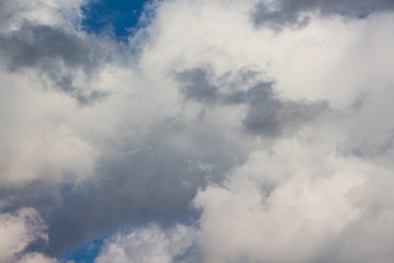 Fototapeta premium White and gray storm clouds in the blue sky_
