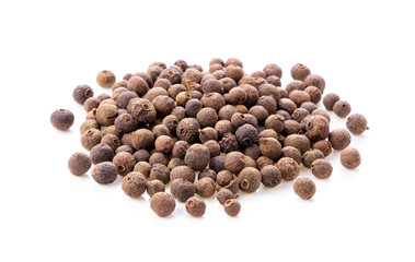 Allspice berries (also called Jamaican pepper or newspice) over white background.