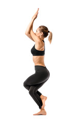 Beautiful young woman practicing yoga on white background