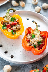 Baked pepper with chicken, mushrooms and tomatoes.