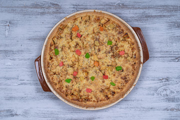 Homemade organic apple pie dessert ready to eat, close up. Apple tart with walnut. Close up