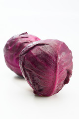 Fototapeta premium Fresh Purple cabbage on white background