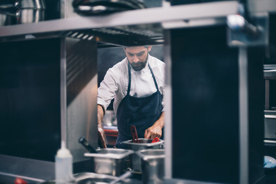 Chef At Work In A Restaurant Kitchen