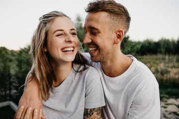 Portrait of young laughing couple