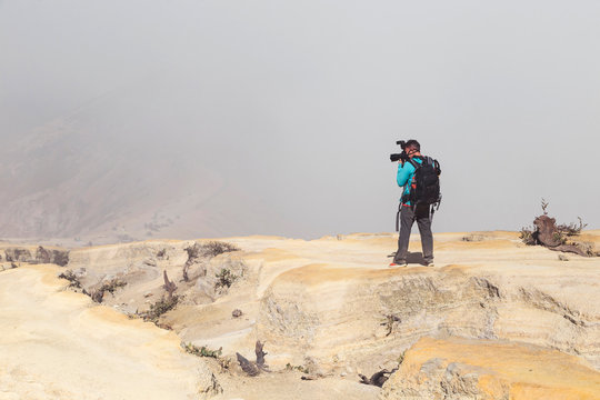 Man with camera, Ijen volcano, Java, Indonesia