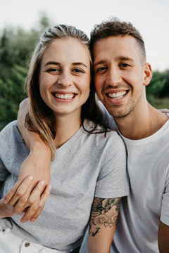 Portrait of young laughing couple