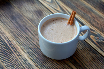 Hot chocolate with milk or cocoa in mug Warm autumn drink