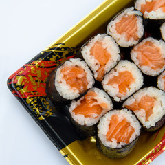 Sushi Roll with salmon on the white background .Food abstract background