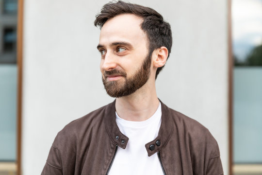 Portrait of a bearded man in the city