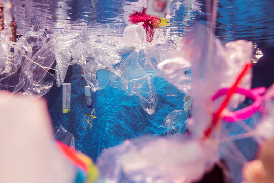 Plastic waste floating in water