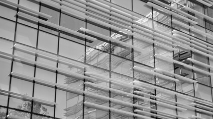 Modern city office building exterior. Black and white.