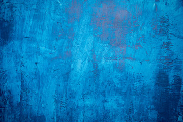 Beautiful blue painted grunge wall texture, different blue tones