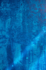 Beautiful blue painted grunge wall texture, different blue tones