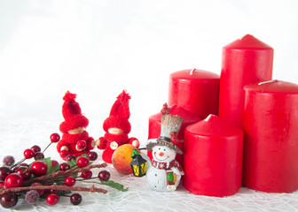 Christmas figurines and candles red