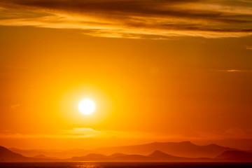 Orange Sun at Sunset Over ocean, Coast