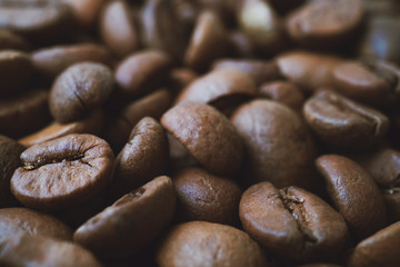 Preparing coffee close up. Photo filtered in vintage style.