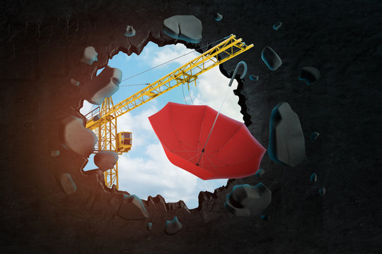 3d rendering of hoisting crane carrying red umbrella and breaking black wall leaving hole in it with blue sky seen through.