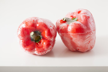 single use plastic packaging issue. peppers vegetables in plastic bag