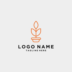 Natural logo - fresh leaves on a gray background.