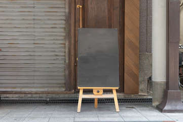 Large blank billboard on a street wall, banners with room to add your own text