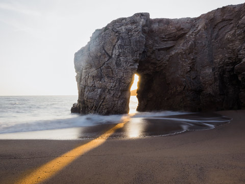 Natural Arch On Beach