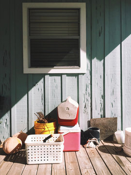 Direct view of household items kept on patio on sunny day