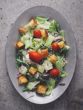 Vegetable salad topped with croutons