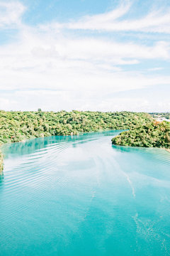 River flowing through lush landscape