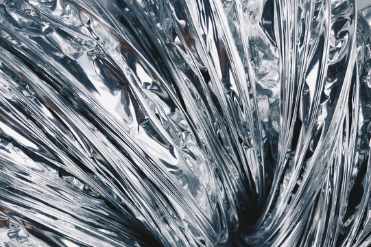 Plakaty View of shiny silver coated plastic