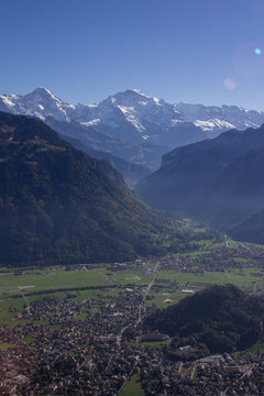 Aerial view of mountains and valley town