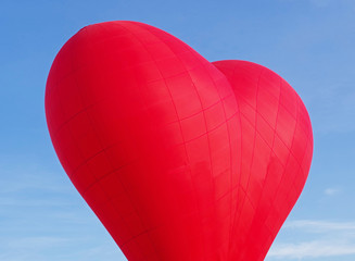 heart shaped balloon on sky background