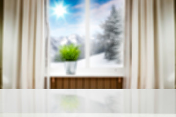 Fototapeta na wymiar Wooden desk of free space for your product and winter window sill background. 