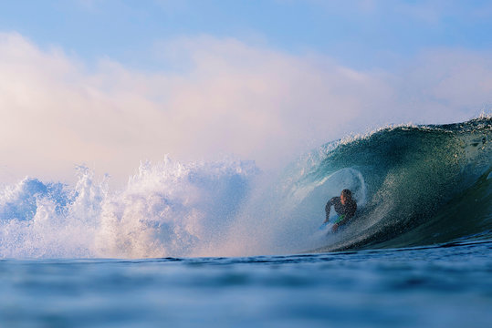 Surfer inside the wave