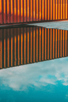 Reflection of cargo container in water