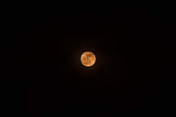 Full yellow moon black background backdrop detail surface