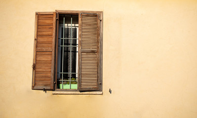 Fototapeta na wymiar Old window with shutters