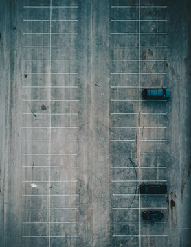 Overhead view of cars parked in parking lot