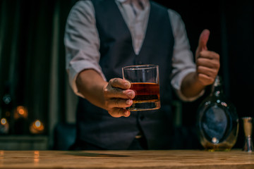man holding a glass of wine