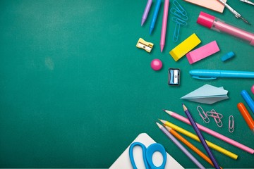 Assortment  of School supplies on  background