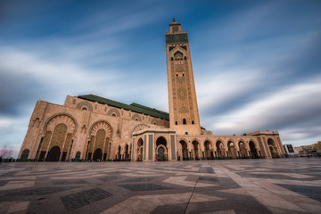The Hassan II Mosque is a mosque in Casablanca, Morocco. It is the largest mosque in Africa, and the 3rd largest in the world. - obrazy, fototapety, plakaty