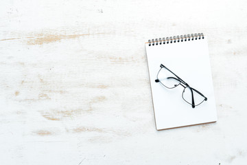 Glasses for vision. Reading glasses. Top view. Free copy space.