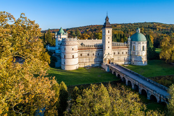 Renaissance castle and park in Krasiczyn near Przemysl , Poland. Aerial view in fall in sunset light © nahlik