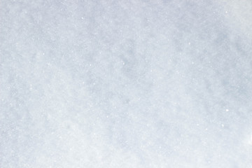 Obraz premium Winter snow. The texture of sparkling snow. Top view of the snow. Snowflakes texture for design.