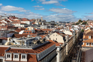 Fototapeta na wymiar Landscape with aerial view of downtown Lisbon, Portugal on sunny day with blue sky in background