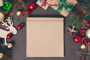 Fototapeta na wymiar Festive background with Christmas decoration and open blank notepad