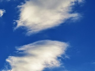white clouds in the blue sky