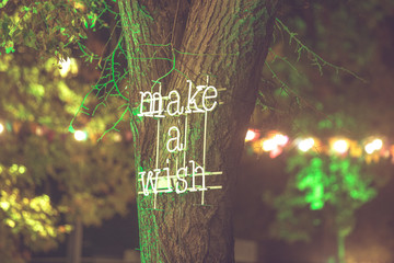 Make a wish neon letters on tree